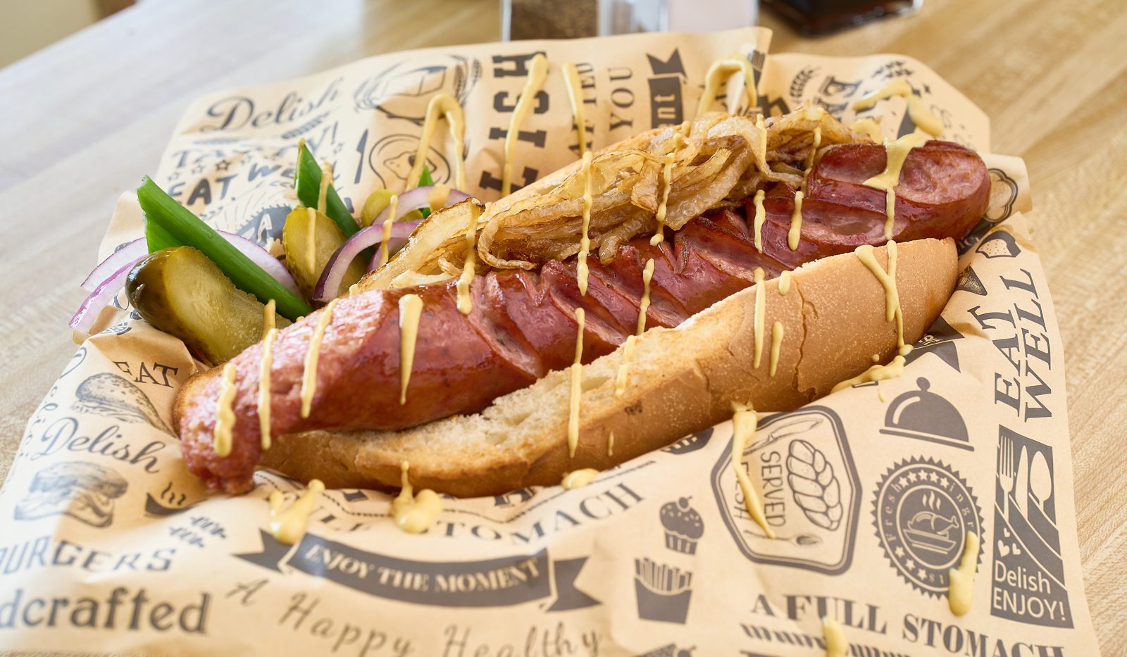 The real kiełbasa sandwich at Tasty Polish Food - grilled sausage, fried onions, mustard, pickles